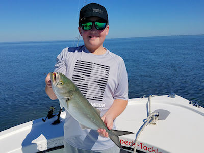 Aaron holding another Bluefish he caught.