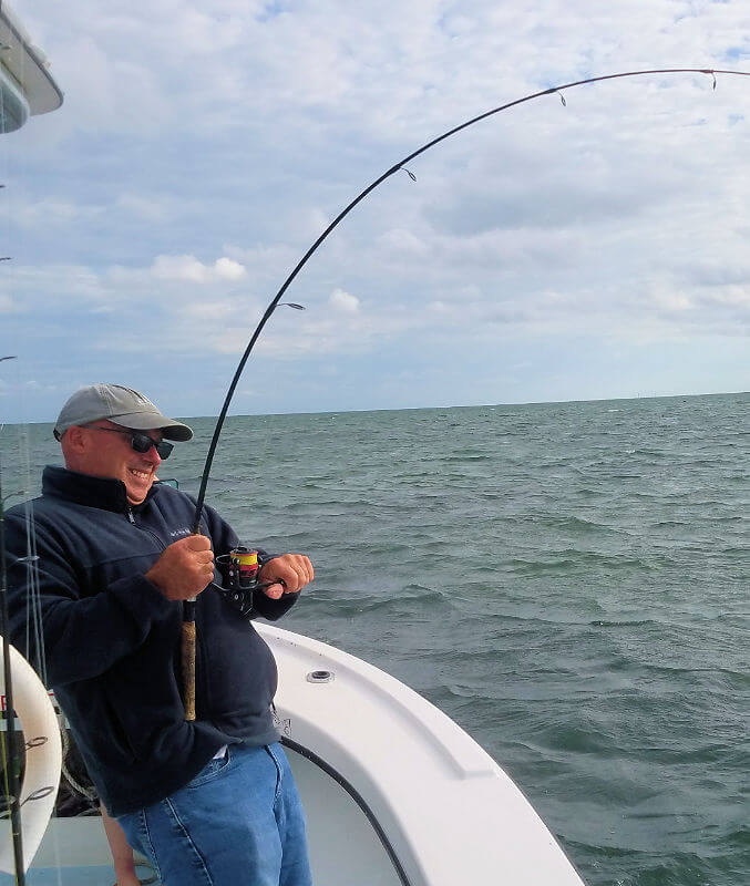 Robin Glenn fights a Red Drum on light tackle.