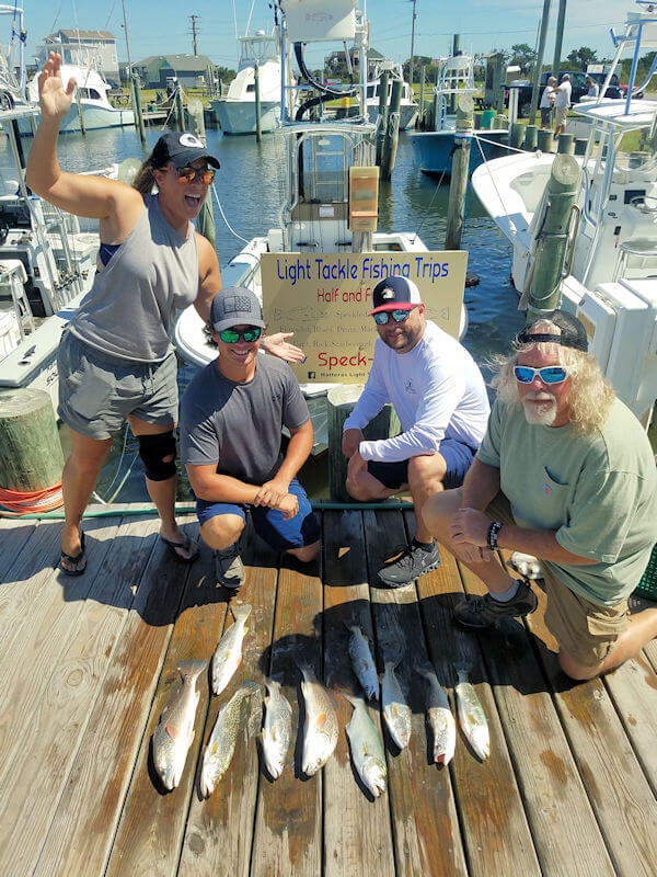 Garrett Elkins and charter party show off their nice catch from their Pamlico Sound charter trip.