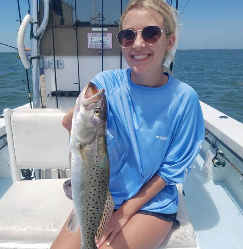 Young lady angler got a nice catch of specks at Cape Hatteras.