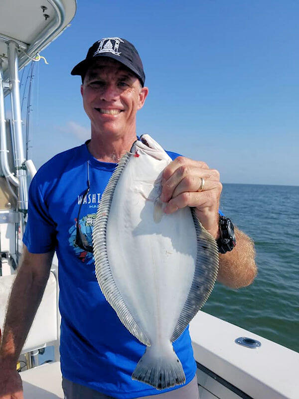 Believe it or not Terry had to release this flounder out of season.