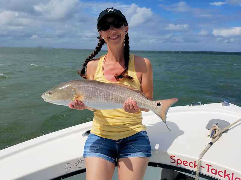 Amy showing off one of her larger Red Drum for Pamilco Sound.