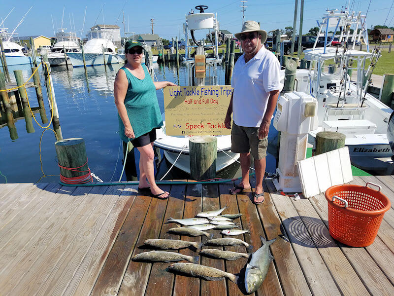 Cindy and Darrel Davidson at the Teach's Lair dock showing off their catch.